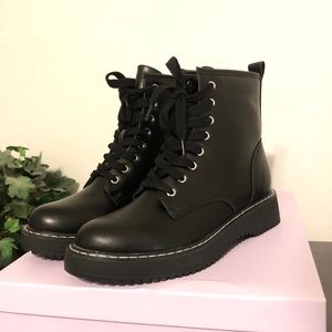 Madden Girl black combat boots. Size 7